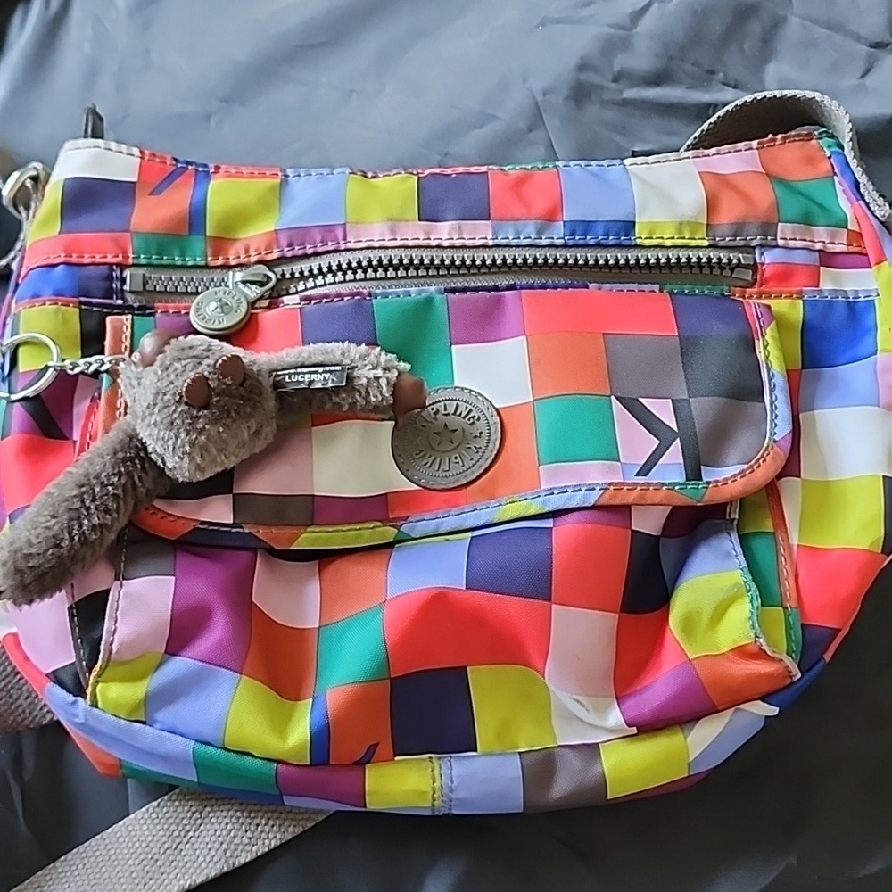 Well loved Kipling Multicolor crossbody purse with gorilla charm